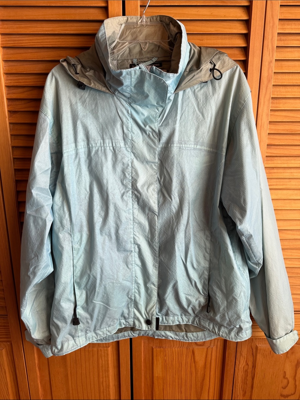 Against the Elements Light Blue Women's Waterproof Hooded Jacket - Large
